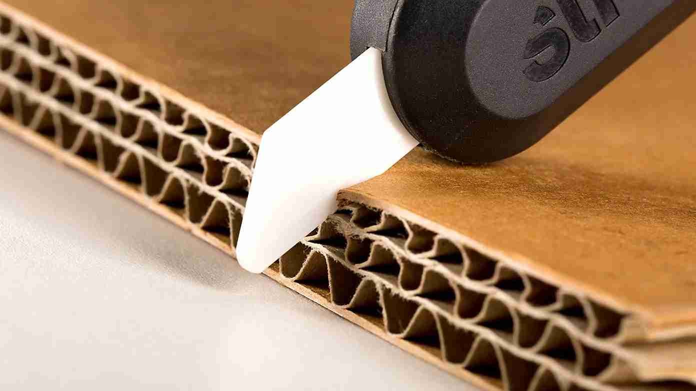 A ceramic blade being used to cut plastic film with zero residue