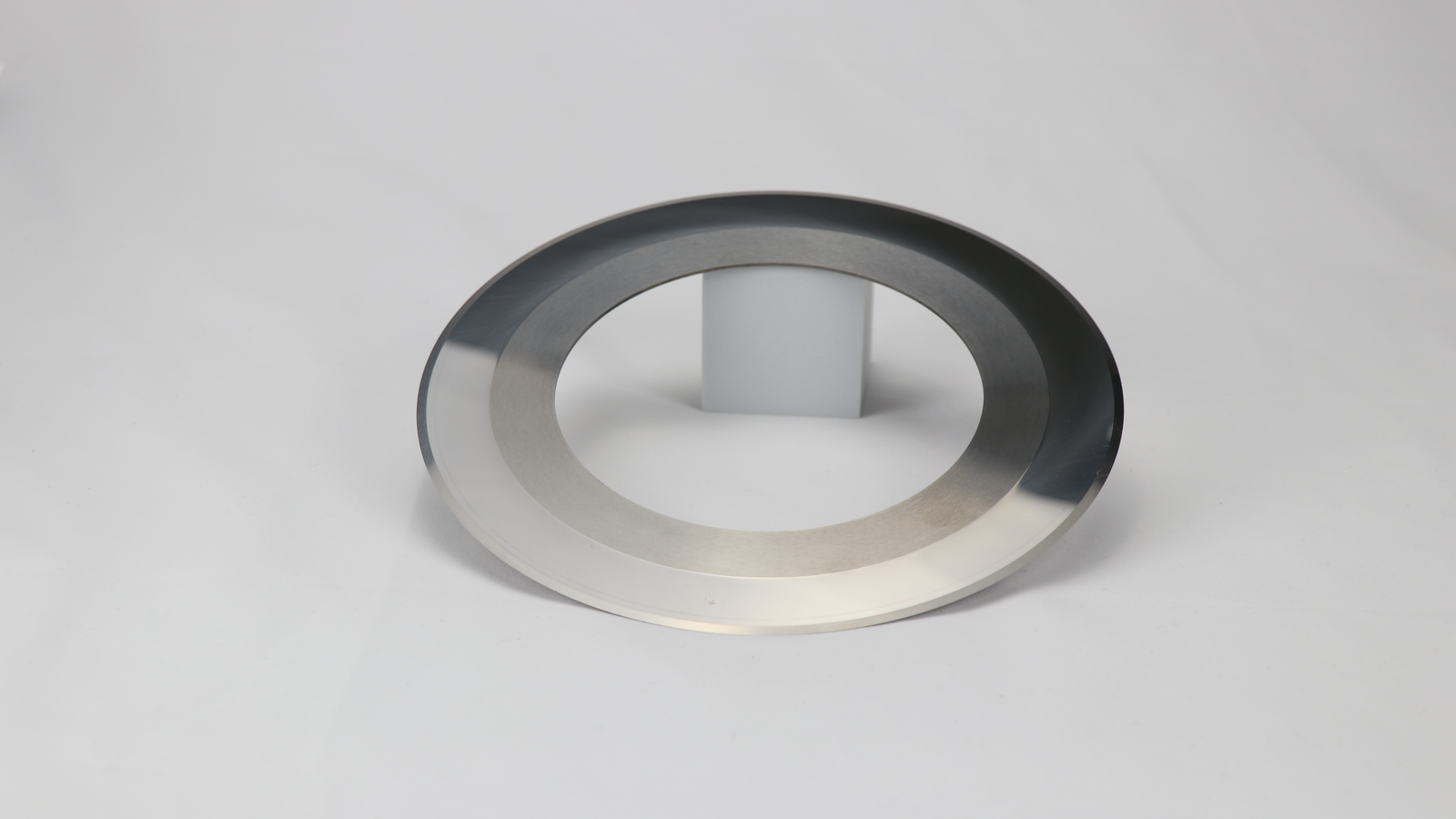 A close-up of a tungsten carbide blade's cutting edge