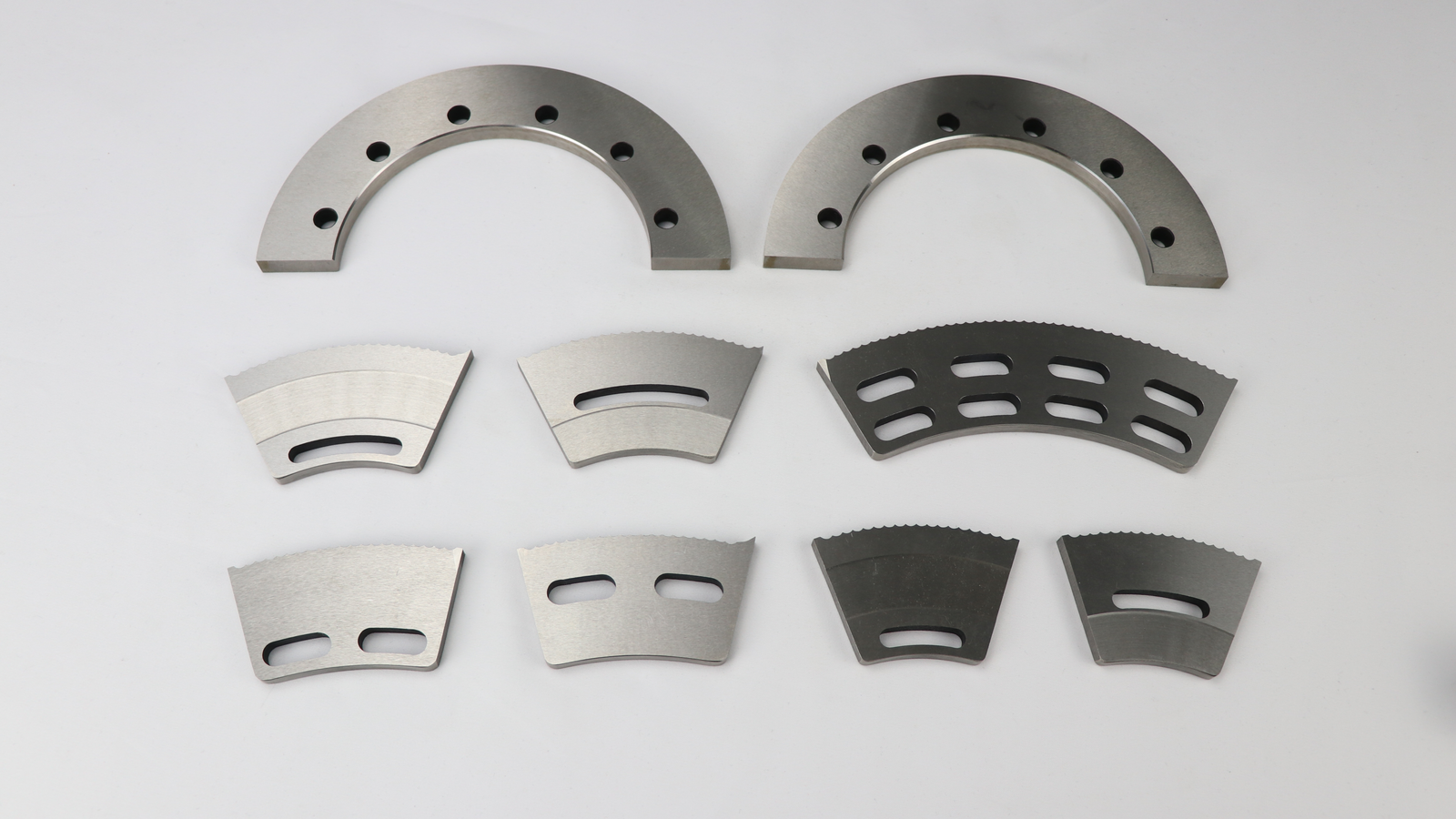 A comparison of different slotter blade tooth profiles, like serrated and smooth