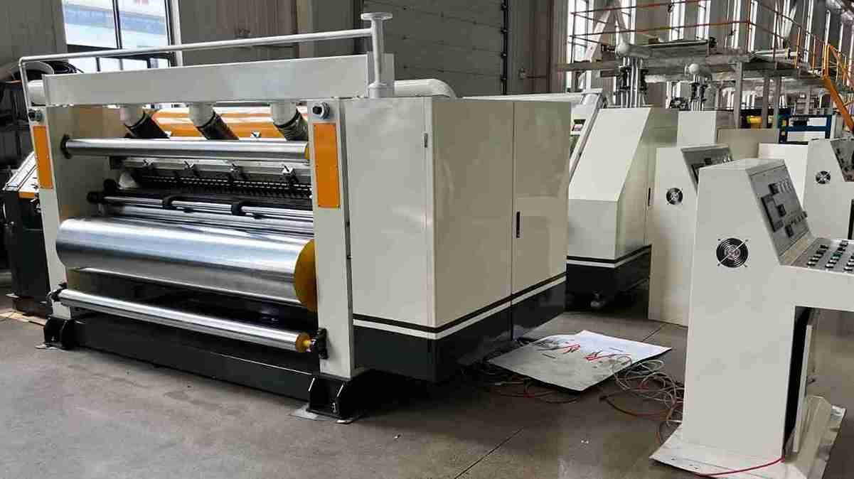 A packaging line with cardboard moving quickly through a cutting machine.