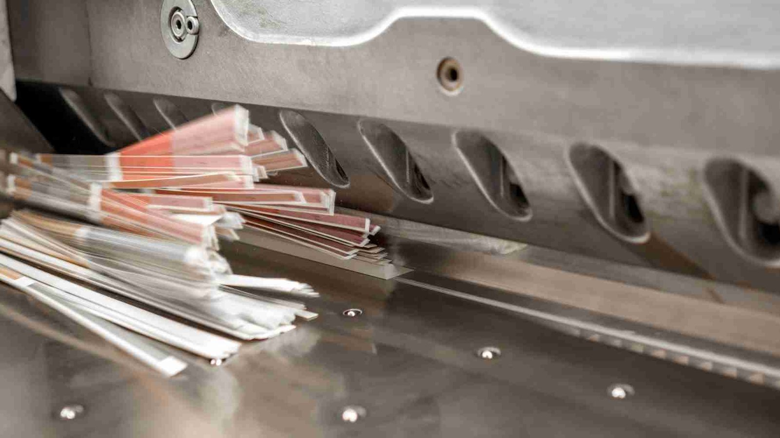 An illustration of blade clearance and rake angle in a shearing machine