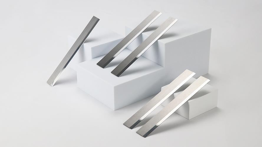 A diagram showing the different layers of a cutting tool: substrate, geometry, and coating.