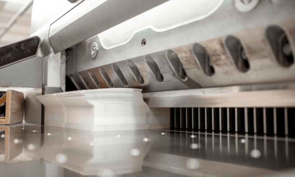 A close-up of a clean industrial blade cutting through material smoothly