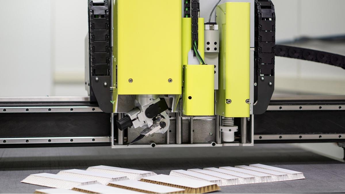 CNC cutting blades on a rack
