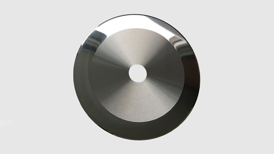 A coated industrial blade reflecting light, showing its smooth surface