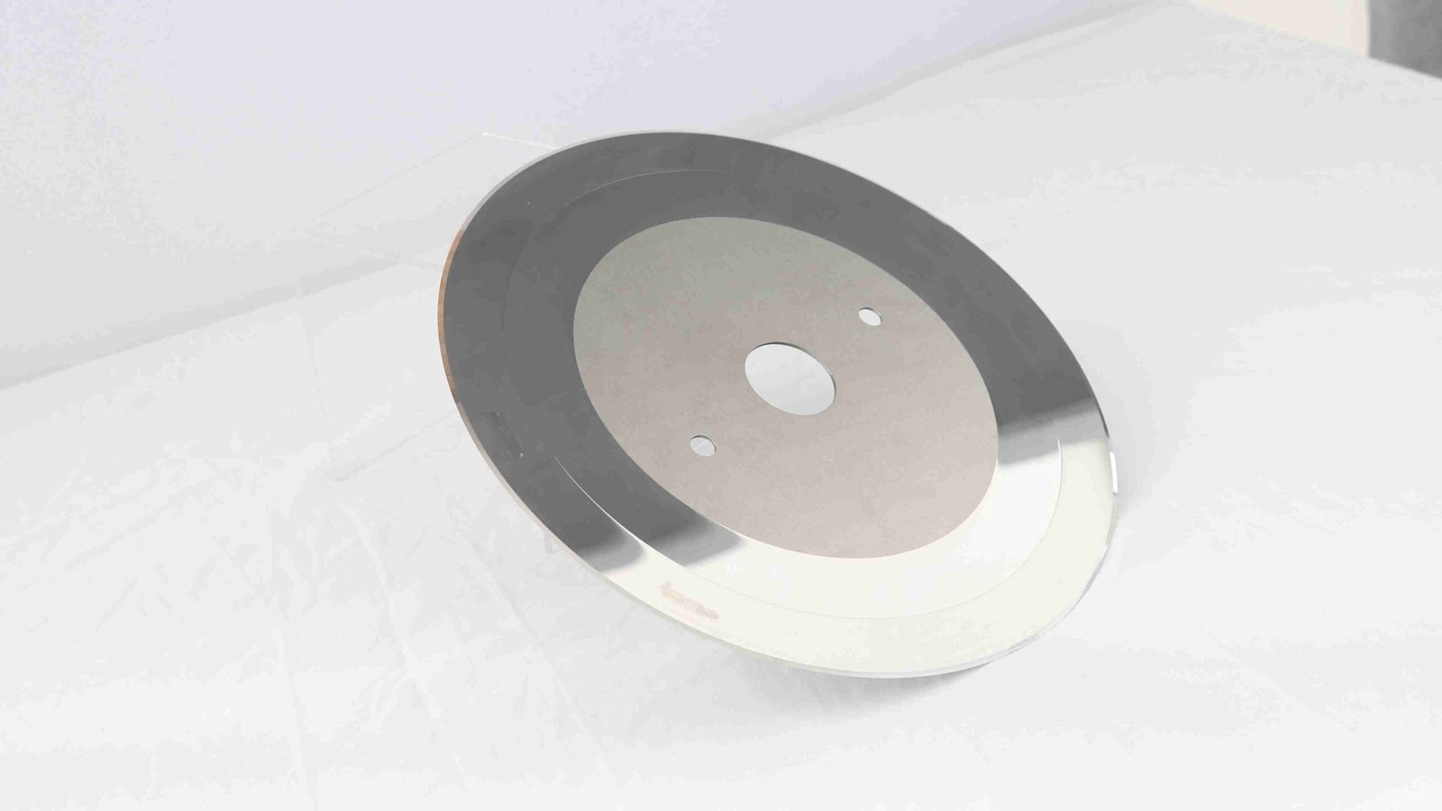 A close-up of a finished tungsten carbide blade, highlighting its sharp edge