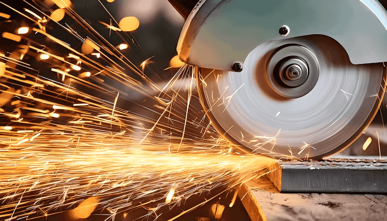 An industrial blade cutting through metal with sparks flying