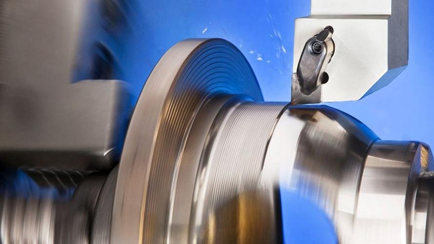 A ceramic blade cutting through a hot material