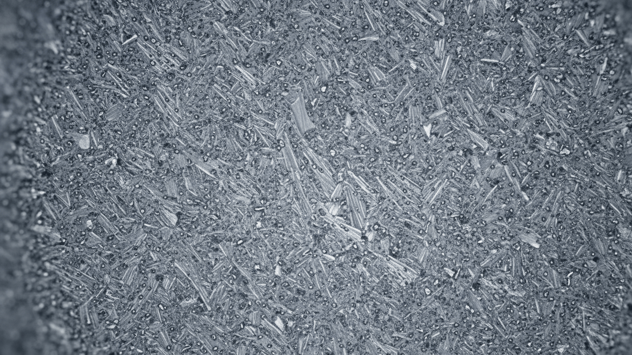 Microscopic view of uniform grain structure versus non-uniform grain structure