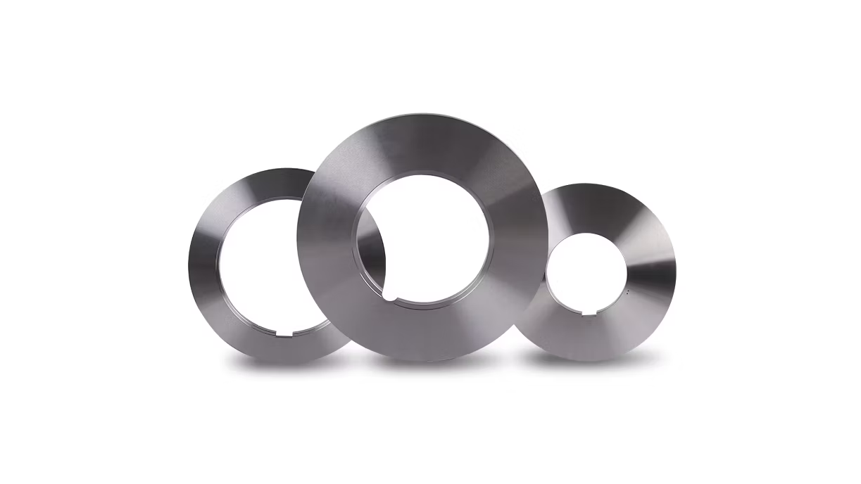 A split image showing a plain spacer versus a spacer with a smooth, reflective chrome-plated surface treatment