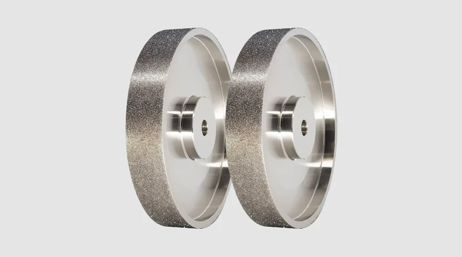 An operator measuring the parameters on a grinding machine