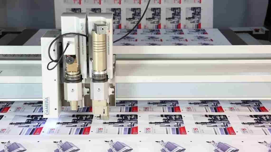 An oscillating blade precisely cutting an intricate shape out of foam