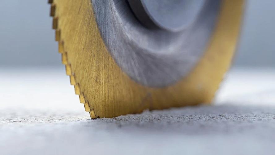 Grey H-type CBN blade finishing a hardened steel mold