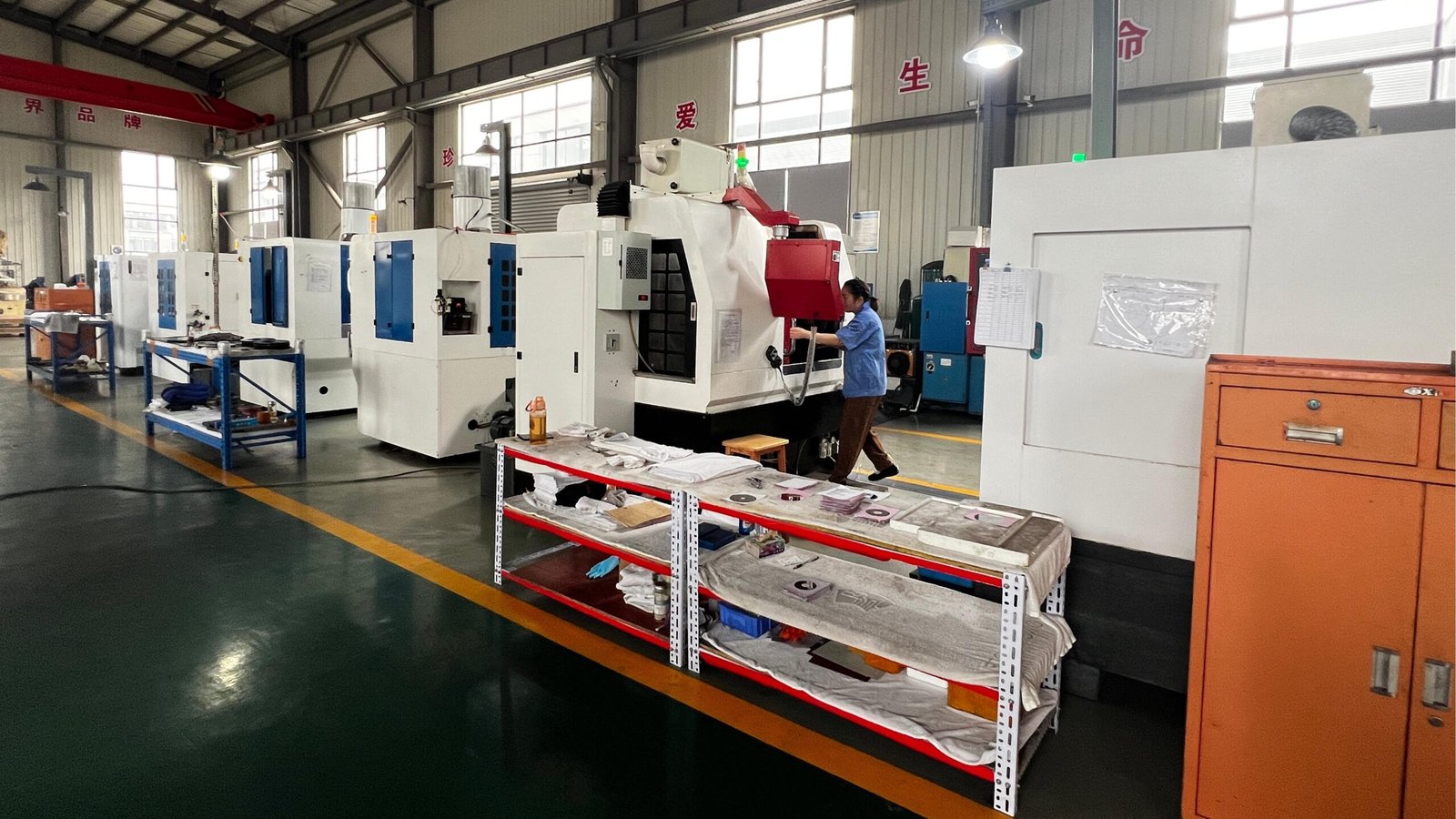 A split image showing a traditional factory vs a modern factory