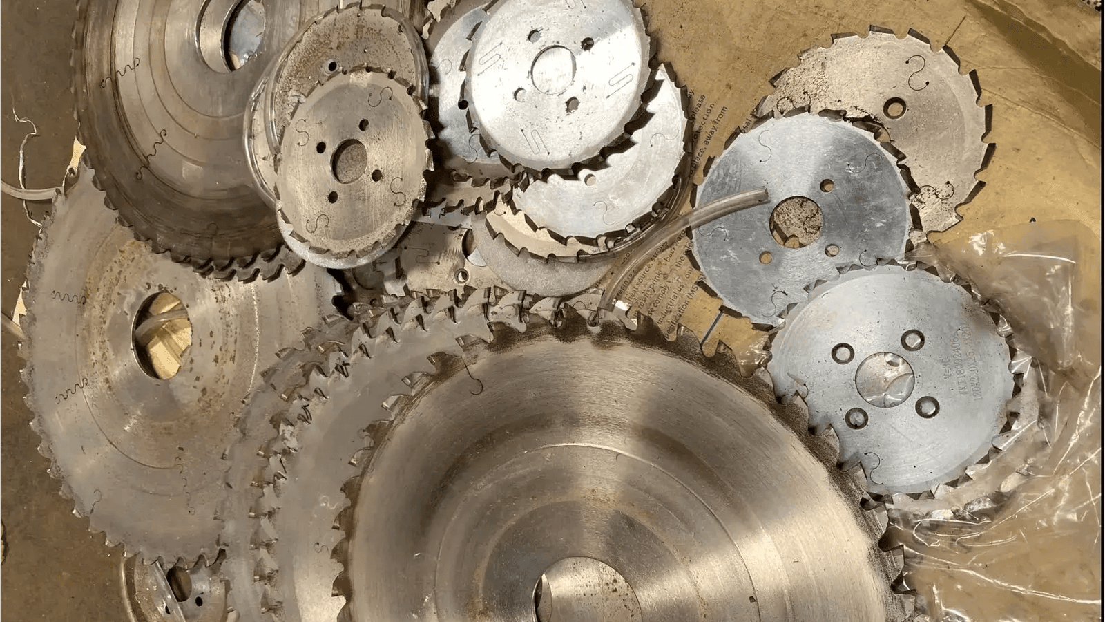 Discarded tungsten carbide cutting blades ready for recycling