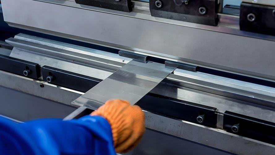 Brown S-type blade cutting an aerospace turbine component