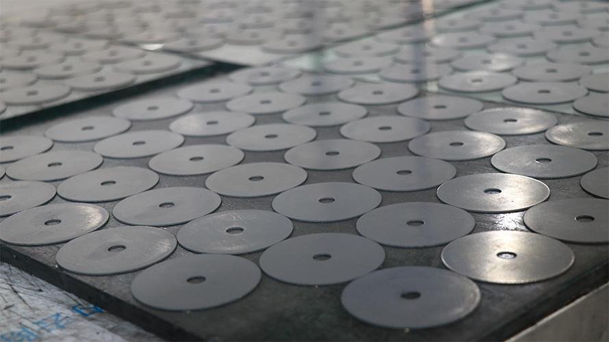 A close-up of a high-precision tungsten carbide industrial blade