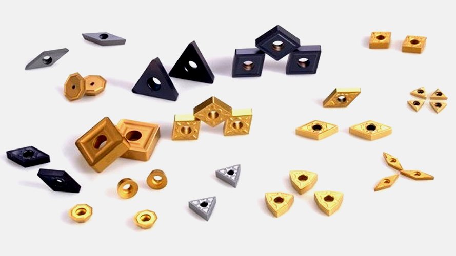 A close-up of a tungsten carbide milling insert